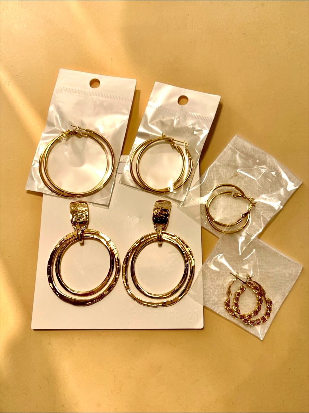 Shiny Gold Double Hoop Earrings.  5 pairs